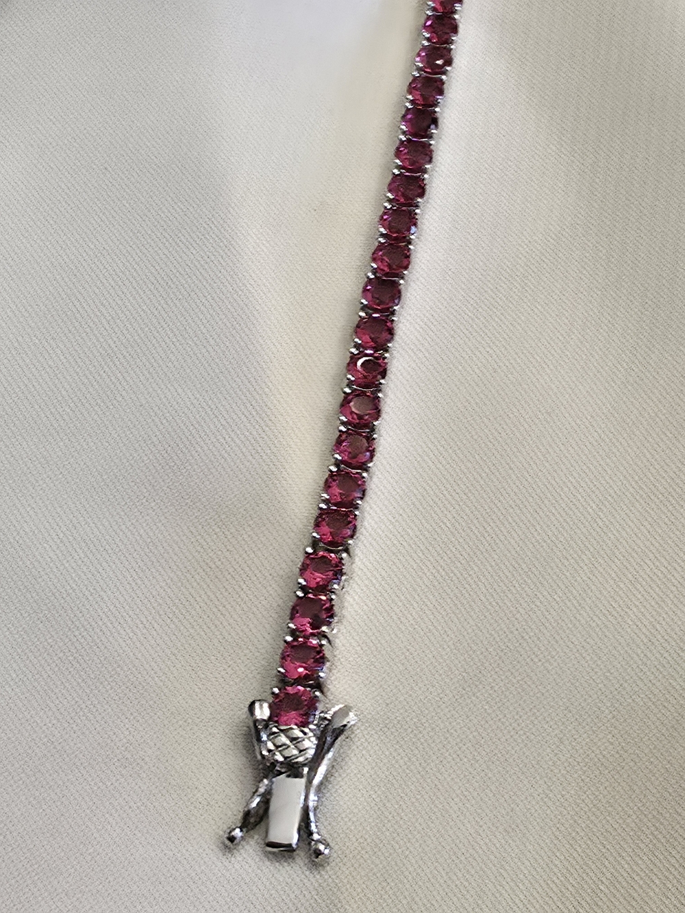 Simulated Red Diamond (CZ) Tennis Bracelet In Silvertone
